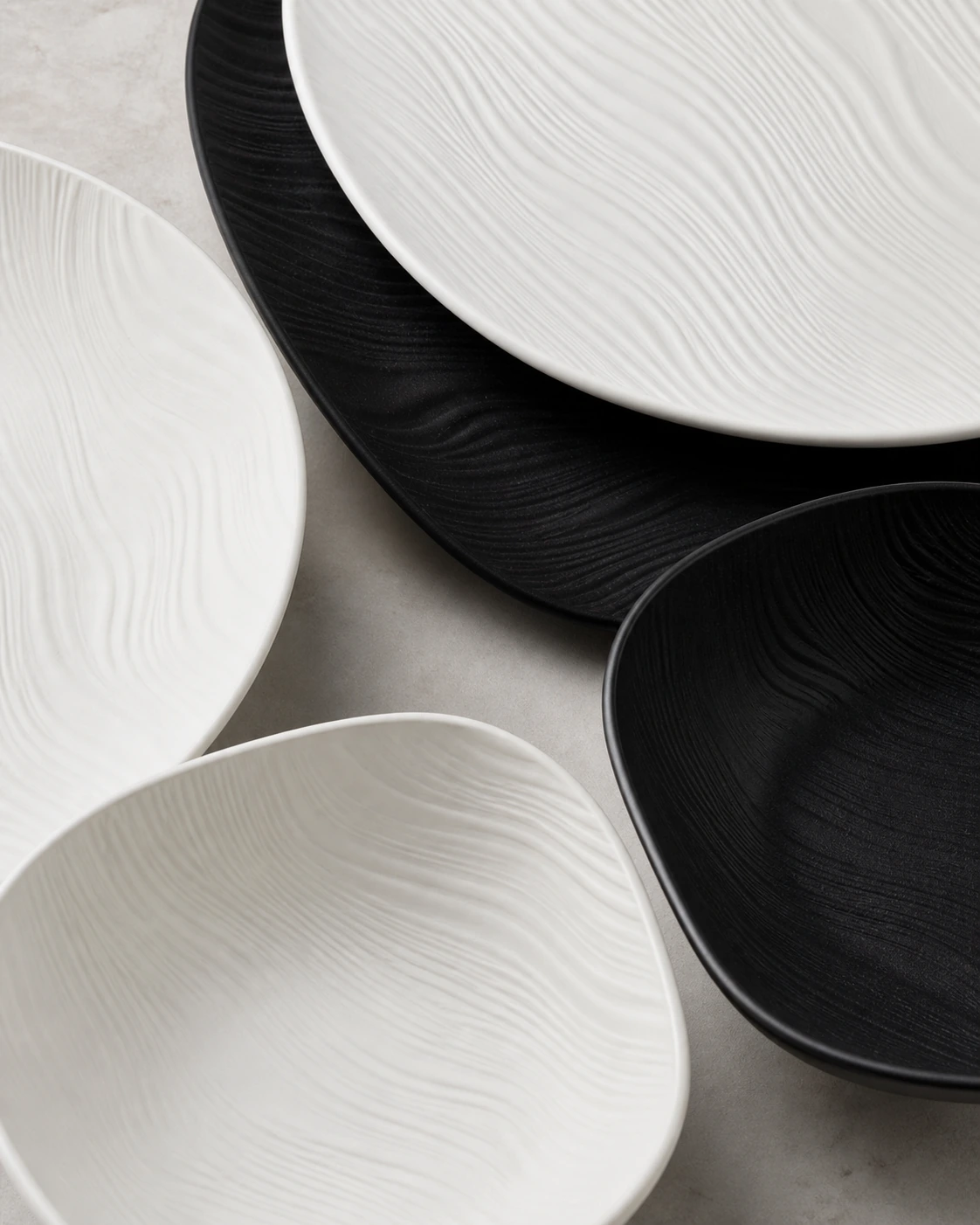 Close view of Strata flowing woodgrain relief in black and white