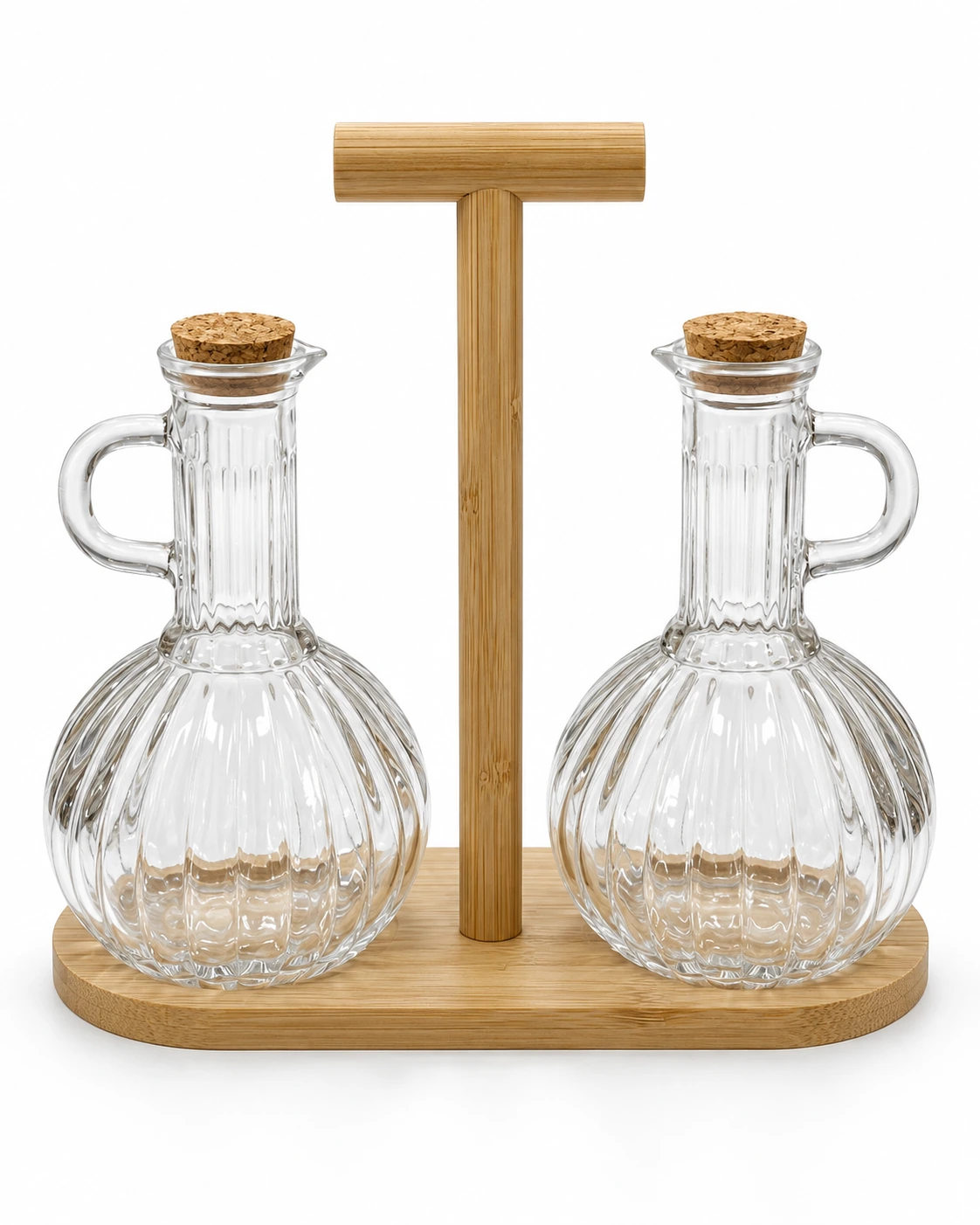 Two fluted glass oil and vinegar bottles with a bamboo carrier