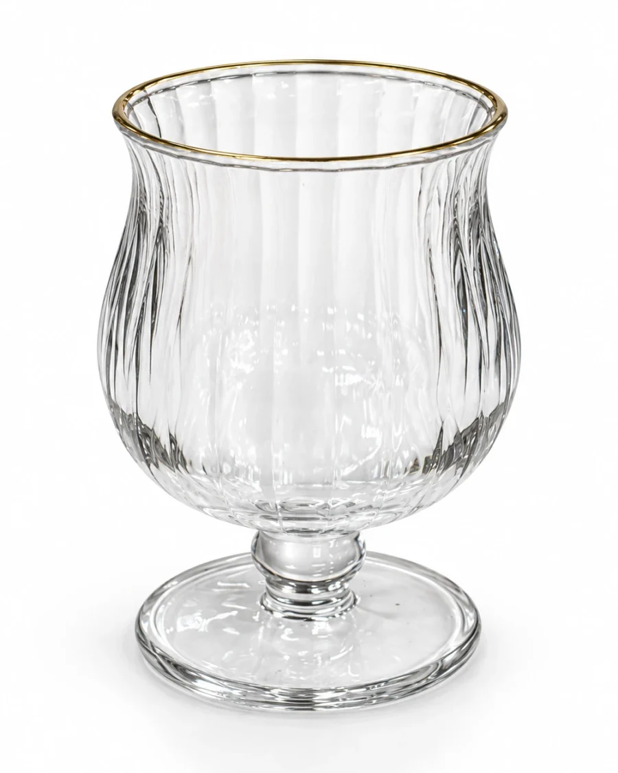 Clear glass goblet with a gold-coloured rim