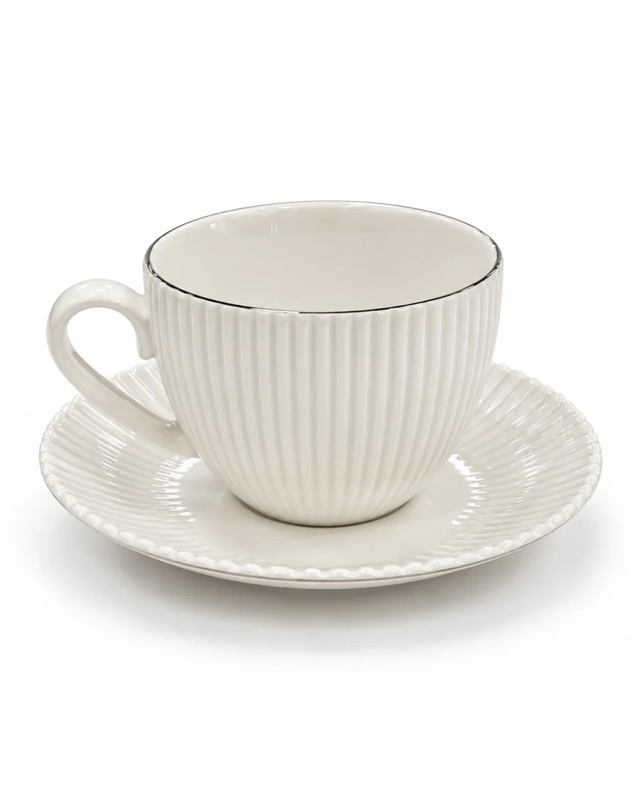 Large ivory porcelain cup and saucer with fluted details
