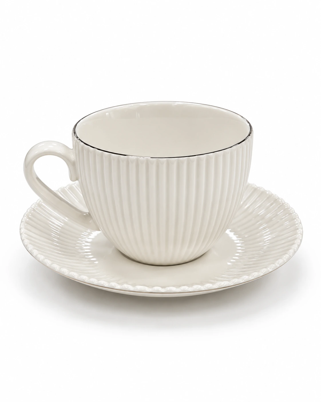 Large ivory porcelain cup and saucer with fluted details