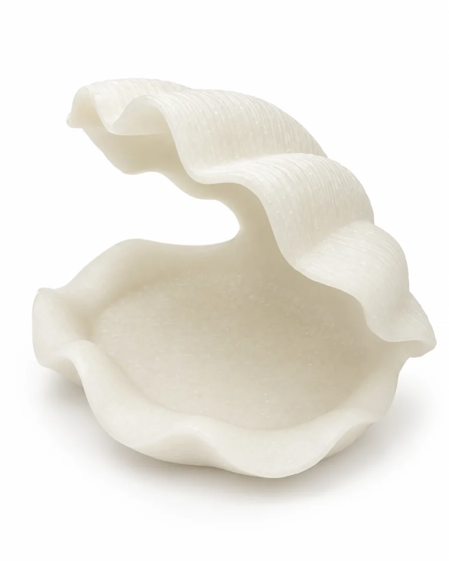 Small ivory polyresin decoration with a sculpted shell shape