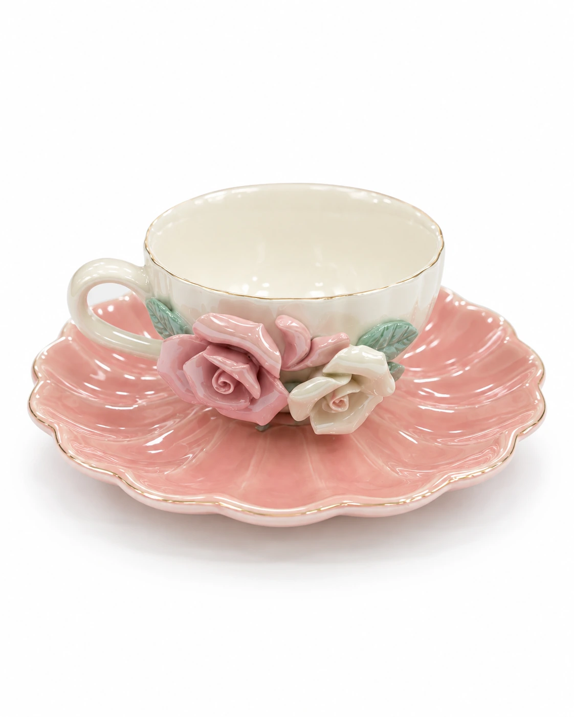 Porcelain cup and saucer with pink and ivory rose details and green leaves