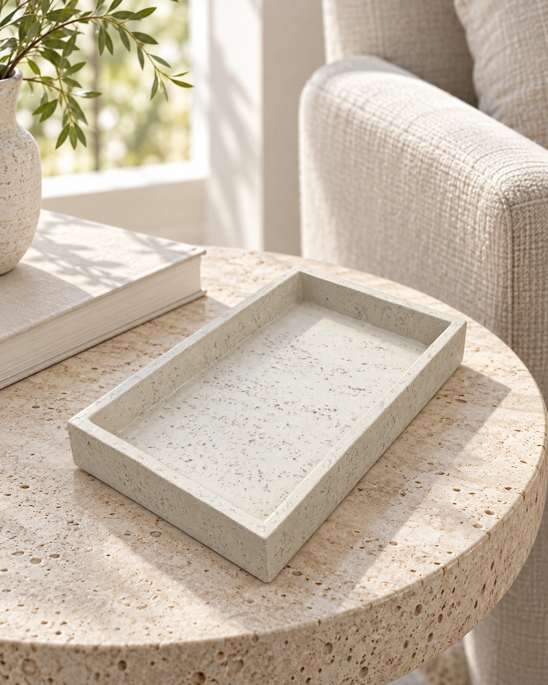 Small stone tray with rounded corners in a bright interior