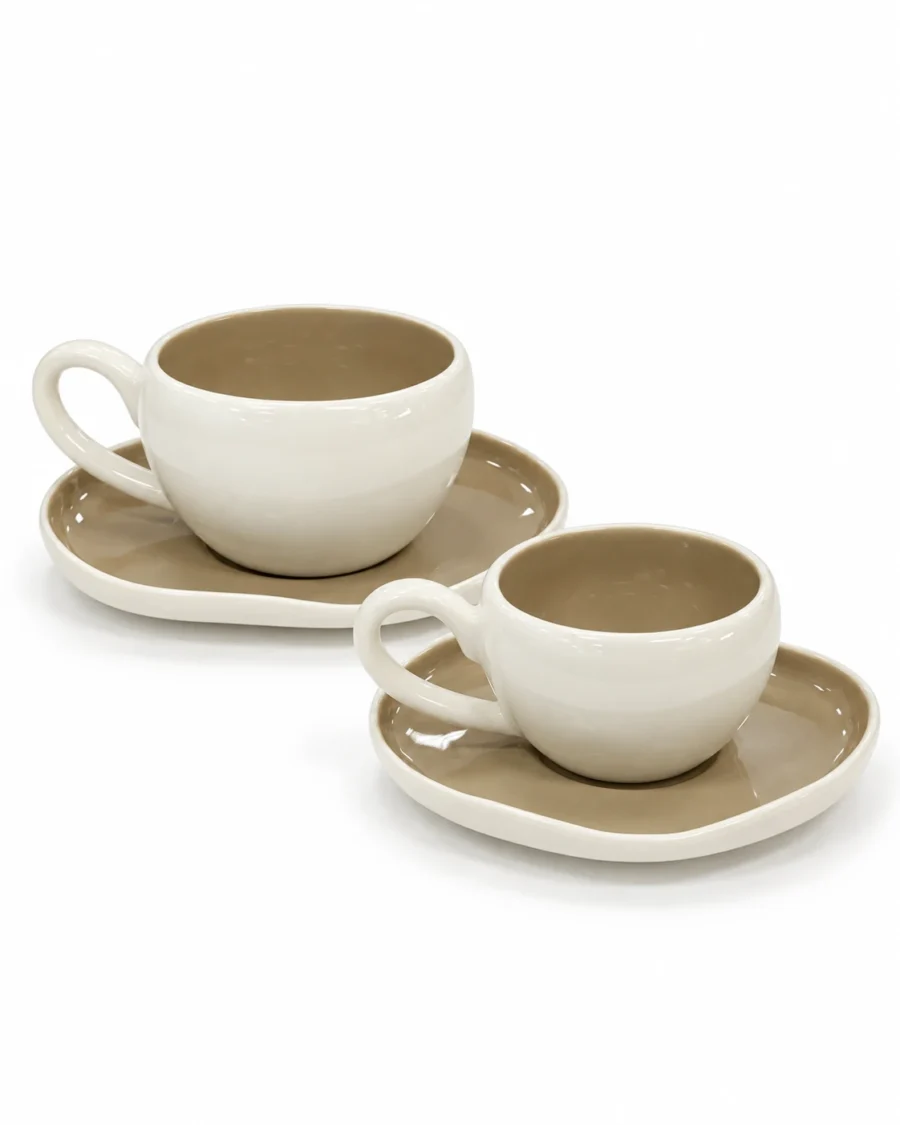 Porcelain cups and saucers with ivory exteriors and taupe interiors